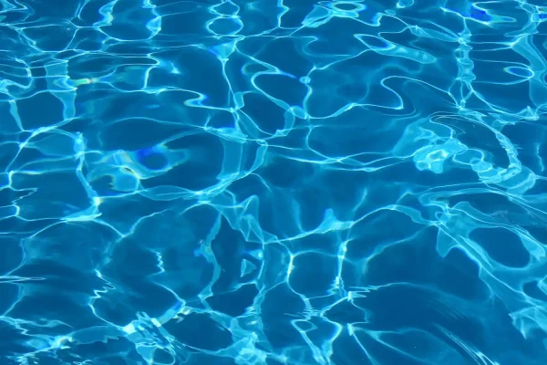 Strawberry Moon Miami featured image of a clear blue pool.